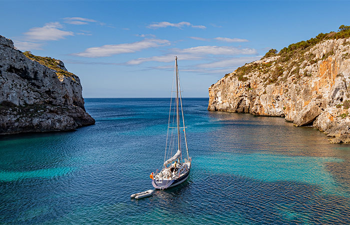 Paseo en barco por la costa sur, clase de cocina en Ciutadella