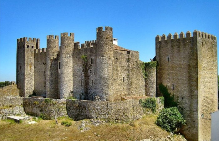 Traslado a Oporto, parada en Óbidos y Nazaré